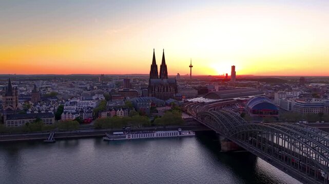 Aerial view of the skyline of Cologne, Germany, with River Rhine and Dome during a beautiful summer sunset
