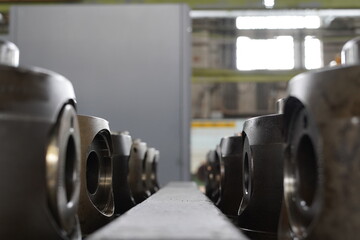 Symmetrical row of heavy duty locomotive diesel engine pistons © YiChuan
