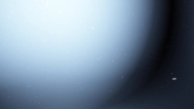 Blue light leak with soft gradient glow and floating dust particles on dark background for overlay. Smooth blue light leak glow with floating particles. Soft blue light leak gradient with dust effect