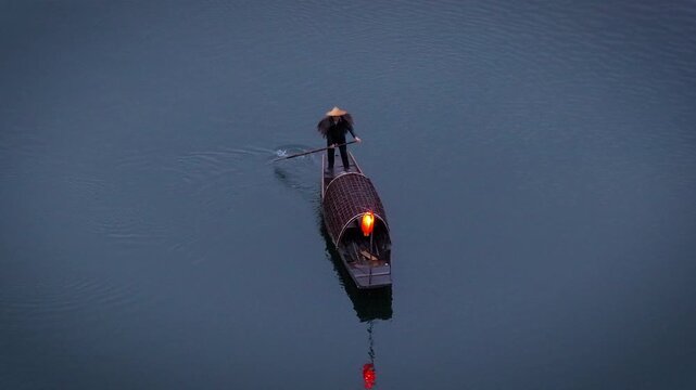 Aerial View of Fishermen cast nets to catch fish in Moon Bay at Wuyuan County, Jiangxi Province, China