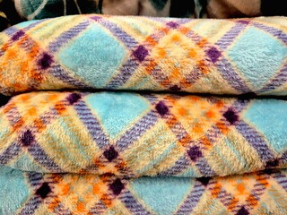 Soft Fuzzy Blanket Texture with Colorful Plaid Pattern and Thick Furry Surface © Fitri