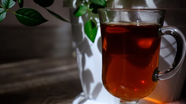 The morning begins with a steaming cup of tea, its delicate aroma filling the air. Atmospheric mood. There&rsquo;s a peaceful stillness, a moment of calm before the day truly begins.