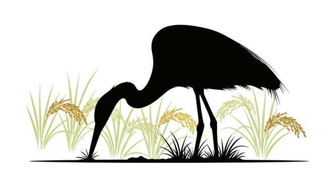 Black silhouette of a bird foraging.