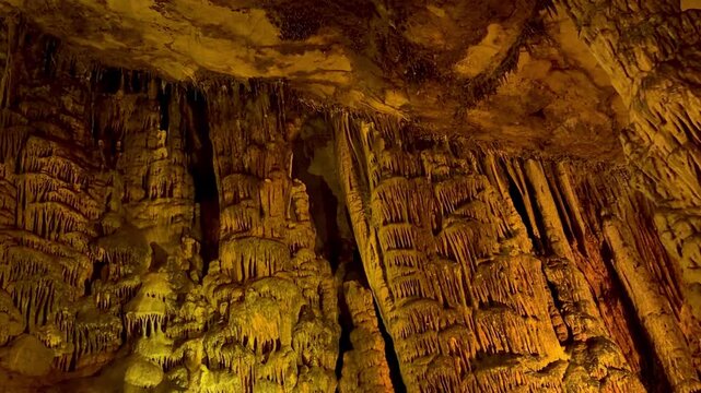 4K video footage of the interior of Ballıca Cave. Stalactites and stalagmites inside the cave. Ballıca, Tokat.