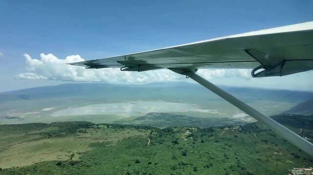 aerial view of the ngorongoro crater after rains from a small plane