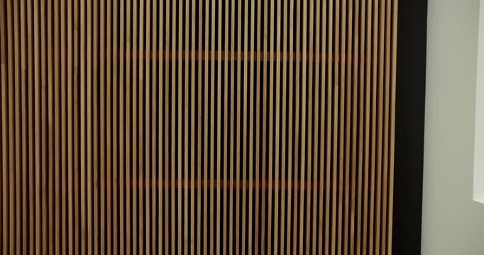 Decorative timber panel. view of decorative lumber panel installed on ceiling in light room. Wooden panels in minimalist interior with modern design.