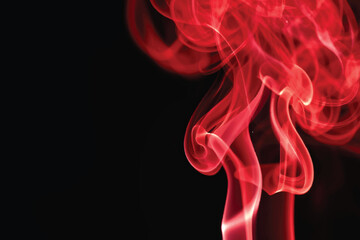 Obraz premium An elegant red smoke swirl pattern flowing on a smooth black background