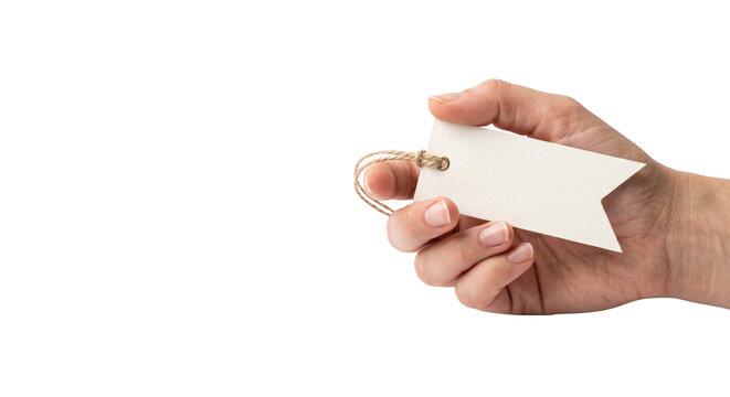 Blank white paper price tag held in hand, minimalist cardboard gift label with string, empty retail hang tag for branding and sales isolated PNG with Transparent Background