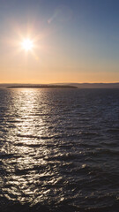 Obraz premium Sailing out of Oslofjord approaching Golden Hour, Oslo, Norway, April 2026