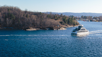 Obraz premium Sailing out of Oslofjord approaching Golden Hour, Oslo, Norway, April 2026