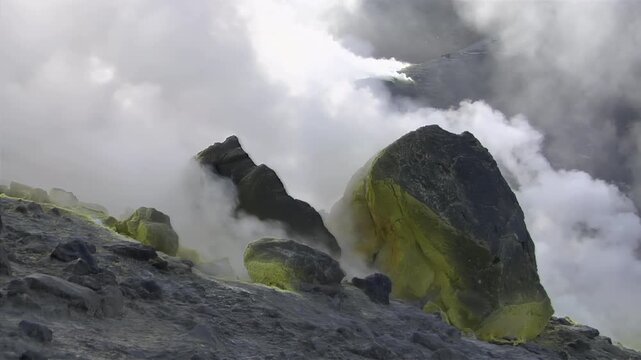 Sulfur fumaroles and chloride crusts on the crater rim, geothermal activity on the slopes of Vulcano Islands, Italy. 