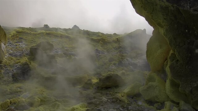 Sulfur fumaroles and chloride crusts on the crater rim, geothermal activity on the slopes of Vulcano Islands, Italy. 