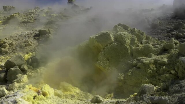 Close-up of vibrant yellow sulfur crystals on a fumarole field. Natural mineral deposits on the slopes of Vulcano Islands, Italy.