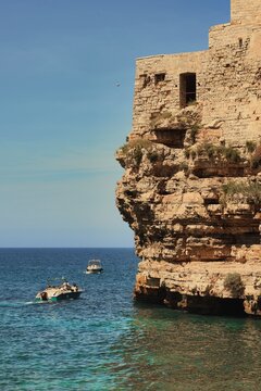 Lama Monachile (also known as Cala Porto) in Polignano a Mare, Puglia, Italy - is a picturesque, rocky bay squeezed between high, vertical cliffs