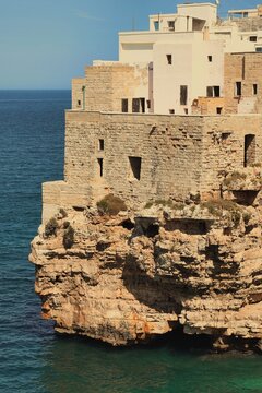 Lama Monachile (also known as Cala Porto) in Polignano a Mare, Puglia, Italy - is a picturesque, rocky bay squeezed between high, vertical cliffs