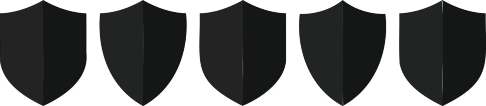 Set of five blank dark gray shields on transparent background vector illustration.