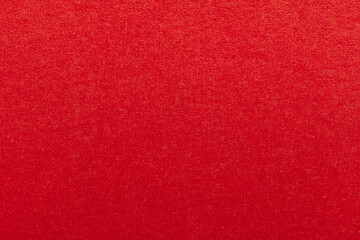 Fototapeta premium Vibrant Red Paper Texture Background,Macro,Close-up high-resolution macro shot of a bright red textured paper surface, perfect for festive holiday backgrounds, creative design elements, or minimalist 