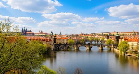 Obraz premium Wonderful spring panorama of Prague with river and bridges 