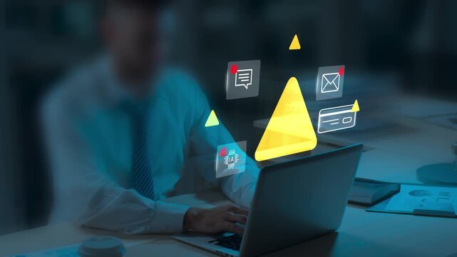 Person Working on Laptop Computer Dealing with Cybersecurity Threats and Digital Security Risks at Office Desk Showing Alert and Warning Signs Concept of Data Protection and Online Security Pro