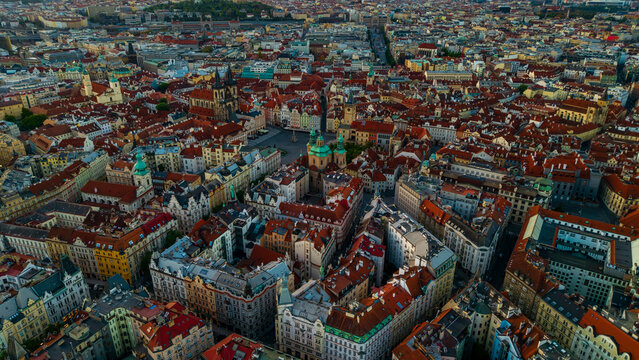 Aerial view of the historic Old Town Square with the Church of Our Lady before Tyn and red rooftops in Prague, Prague, Czechia.