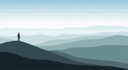 Obraz premium Silhouette of a person on a mountaintop overlooking a misty mountain range