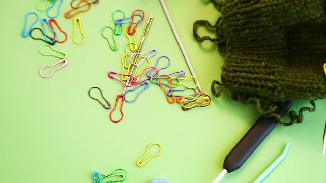 knitting yarn with needles and tools flat lay crafting concept