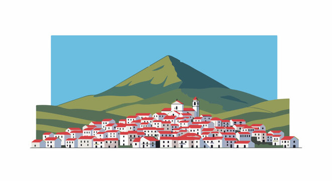 Picturesque hillside village with red roofs nestles below a majestic mountain