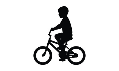Obraz premium Silhouette of a young boy riding a bicycle, enjoying outdoor activity and freedom.