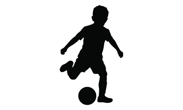 Silhouette of a young boy kicking a soccer ball, representing sports and active childhood