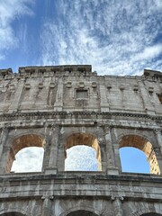 Obraz premium Colosseum in Rome from low angle with dramatic sky