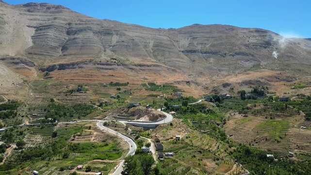 Akoura Lebanon Mountain Road and Green Terraces Cinematic Forward Flyover shot with Drone