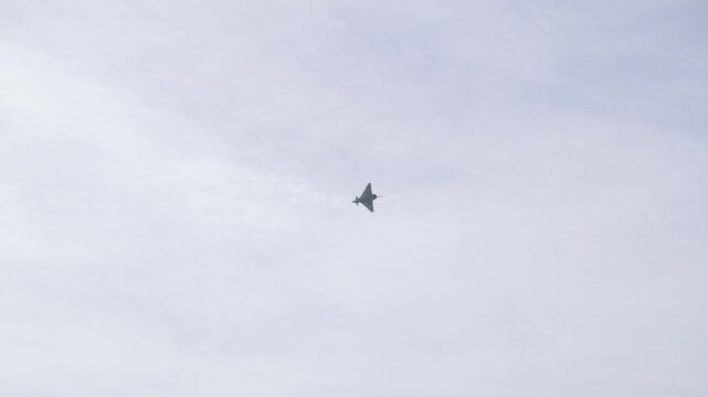 Aircraft display in the sky.
65th anniversary of the founding of the PAN - Frecce Tricolori, Italian Aerobatic Team