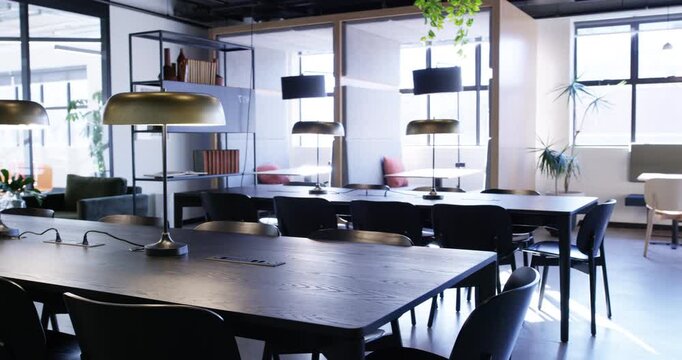 Empty, modern office and furniture in workplace or building for meeting, career and workspace. Business space, chair and interior design of seminar, workshop or presentation with corporate company