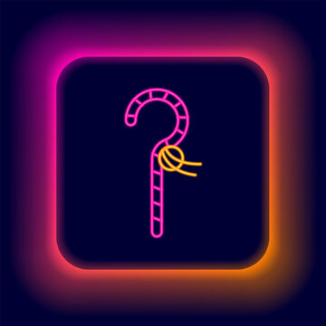 Glowing neon line Crook icon isolated on black background. Ancient Egypt symbol. Scepters of egypt. Colorful outline concept. Vector