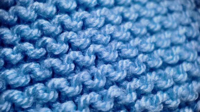 Blue knitted fabric macro texture loop background textile pattern close up