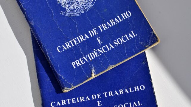 Brazilian work permit on a white surface, symbolizing opportunities and professional stories. Brazilian work permit on a white surface, an essential document for Brazilian professional narratives.