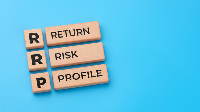 Return risk profile concept with wooden blocks and RRP abbreviation