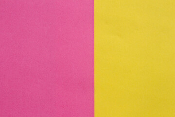 Fototapeta premium Pink and Yellow Paper Background Split, Minimal Color Contrast Abstract Design Template Close Up