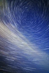 Star Trails Creating Spiral Pattern in Night Sky © lucky pics