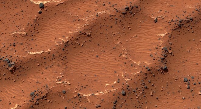Abstract red sand texture with rocks and wavy patterns for backgrounds