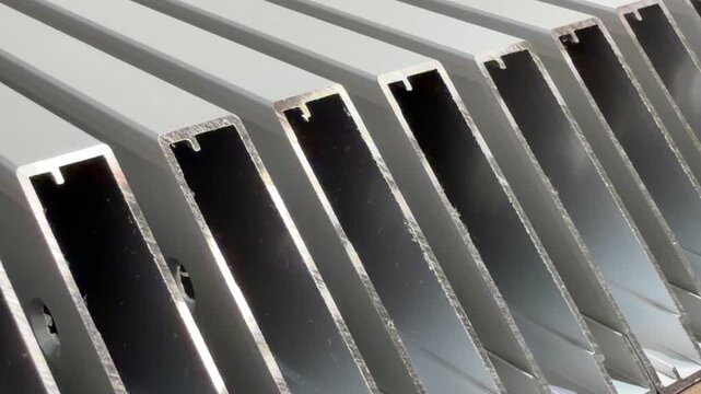 Modern materials close-up: aluminium profiles with a sleek design, perfect for website content about construction materials.