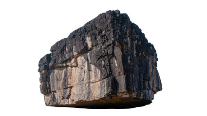 Large dark grey and tan stratified rock formation, isolated on transparent background © Laura