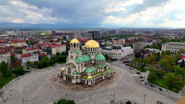 Aerial view of the majestic Alexander Nevsky Cathedral in Sofia. Stunning architecture and vibrant colors. Breathtaking drone view of the cityscape and the cathedral. Bulgaria