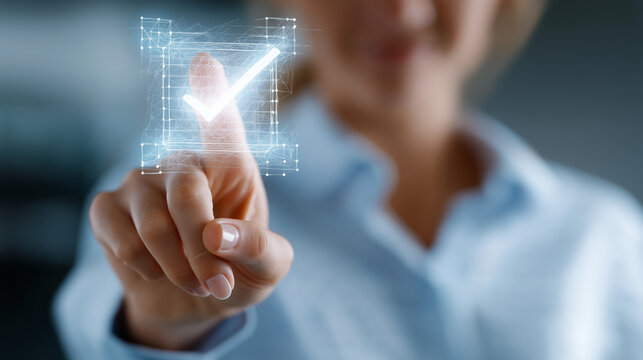 The Digital Approval: A close-up shot of a person's finger selecting a glowing digital checkmark, suggesting acceptance, verification, and technological innovation.