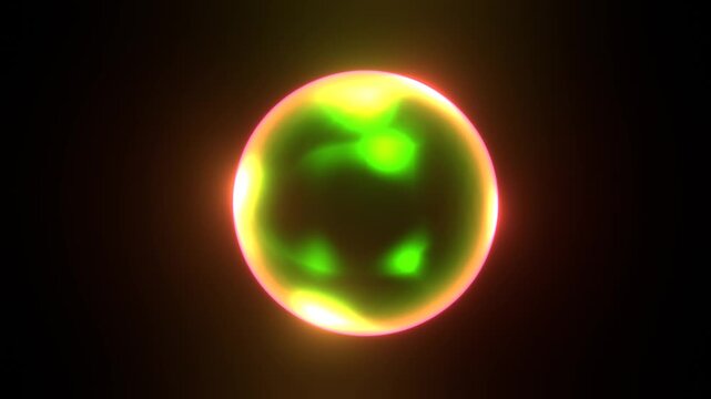 Glowing orb pulses with green and orange light