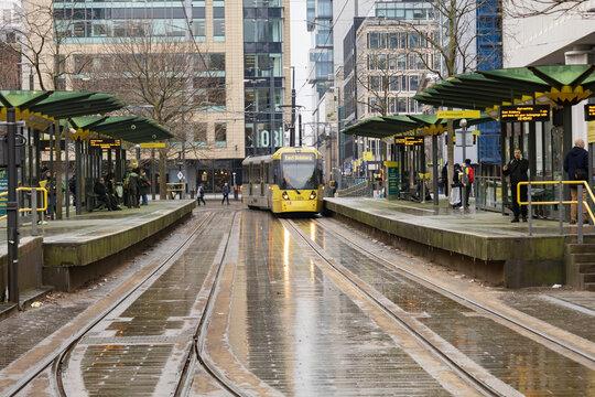 Manchester, uk, January 19th 2025 famous yellow Metrolink Tram at St Peters Square Station. Public Transport Vehicle for local services