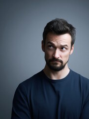 Obraz premium Man disgusted face expression, emotion concept, studio lighting