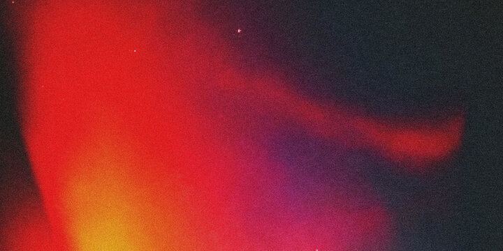 abstract gradient bokeh light background with vibrant red and orange glow for creative design
