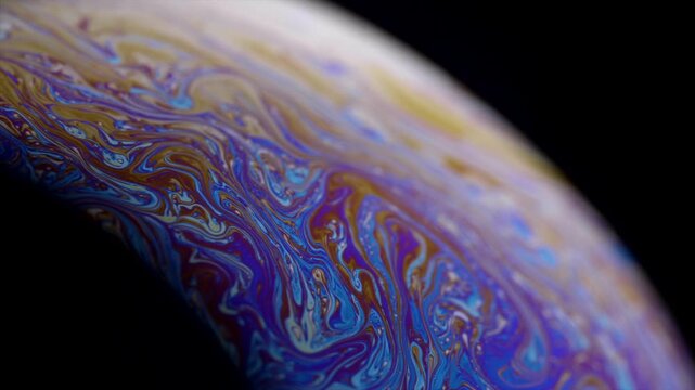 Iridescent Soap Bubble Surface Shows Abstract Patterns of Vibrant Colors Macro Shot Against a Dark Background Creating a Mesmerizing and Dynamic Visual Display