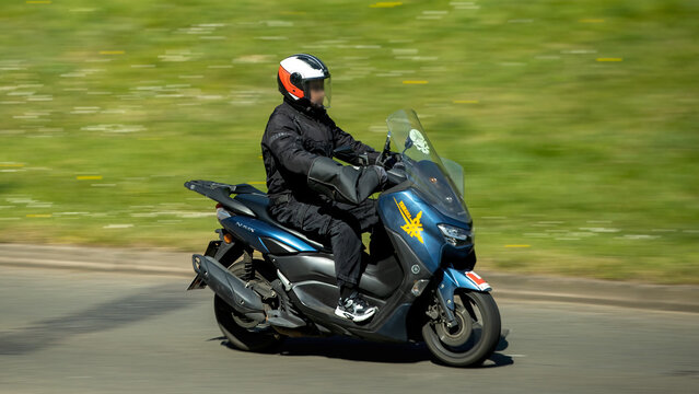 Milton Keynes,Bucks,UK - Apr 22nd 2026: 2024 Yamaha gpd nmax motorcycle driving on a British road